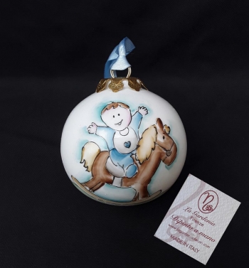 Palla di natale bimbo su cavallo a dondolo