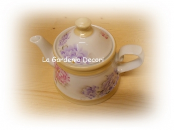 Teiera da fuoco con peonie