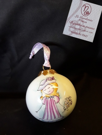 Palla di Natale con bimba romantica