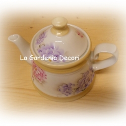 Teiera da fuoco con peonie